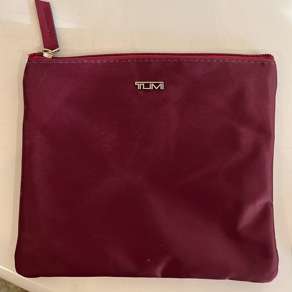 Maroon TUMI zip pouch. NEW!!! PERFECT CONDITION